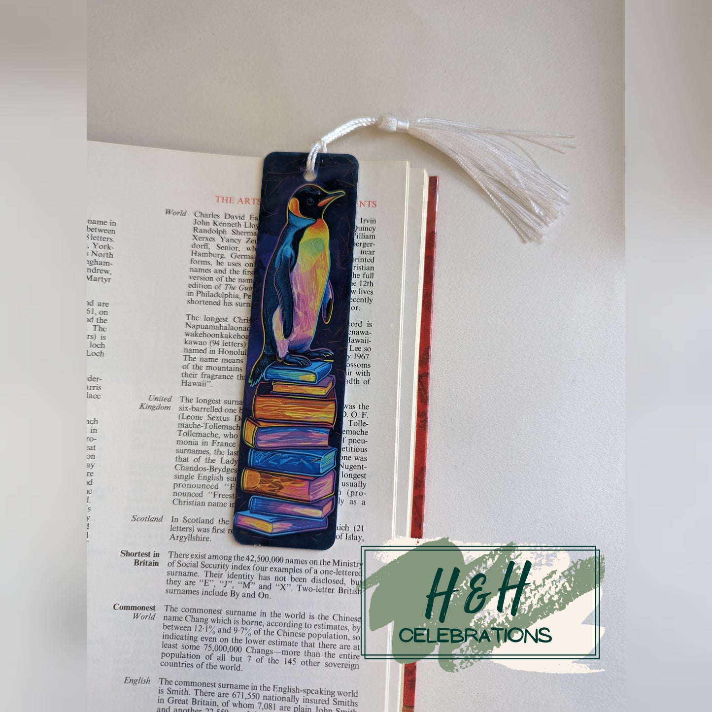 Neon Penguin On Stack Of Books Bookmark