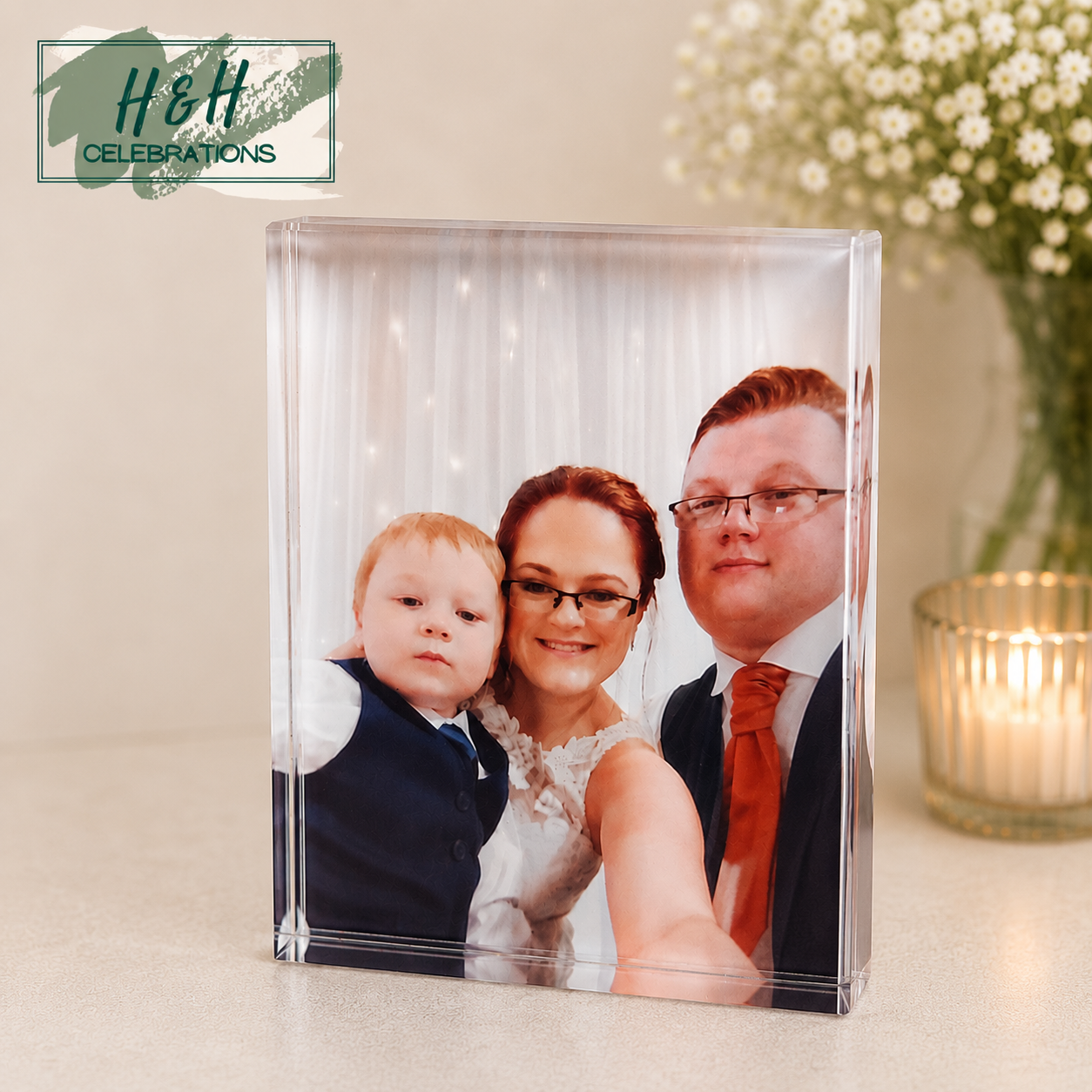 Acrylic block with family photo on a crystal glass block surface.