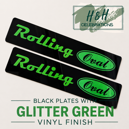 Two black show plates with glitter green vinyl finish text.